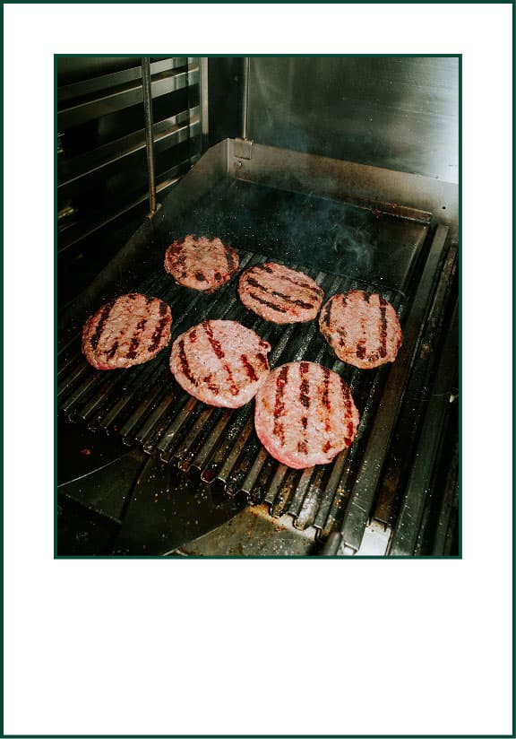Burger patties on grill